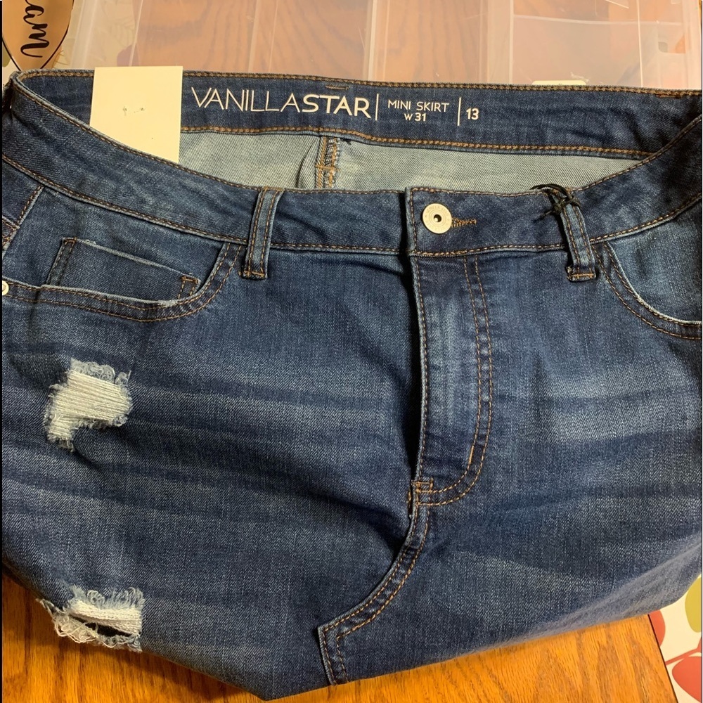 Junior ‘s Ripped  Denim Mini Skirt